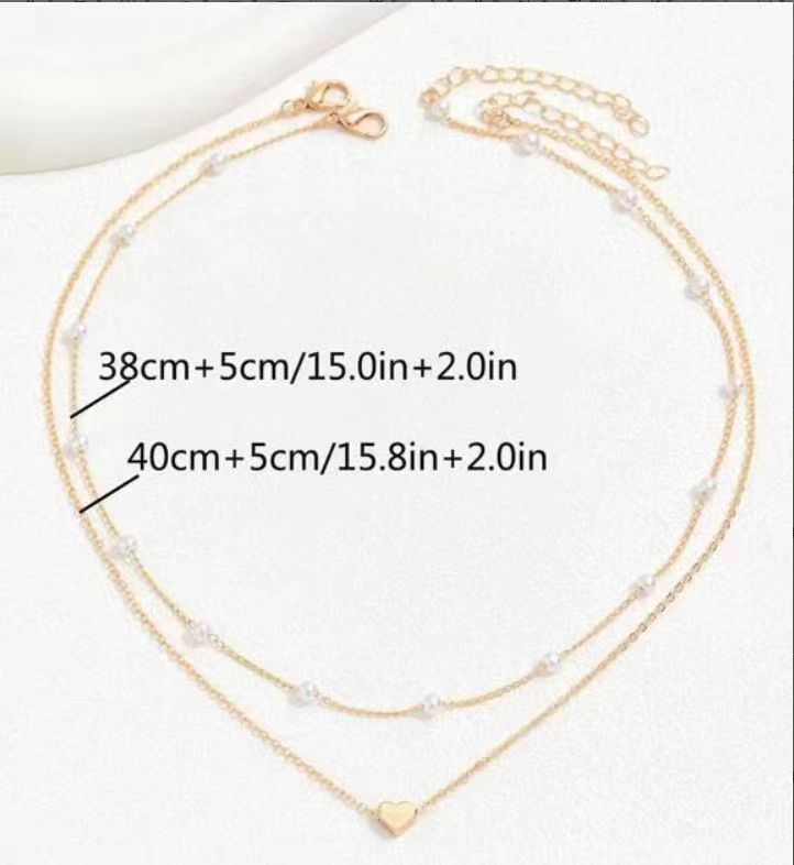 Collar Doble de Perlas con Corazón – San Valentín · fotografía de detalle 1