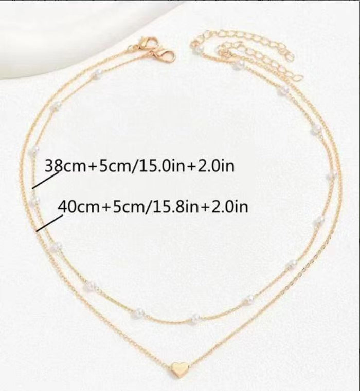 Collar Doble de Perlas con Corazón – San Valentín · fotografía de detalle 1