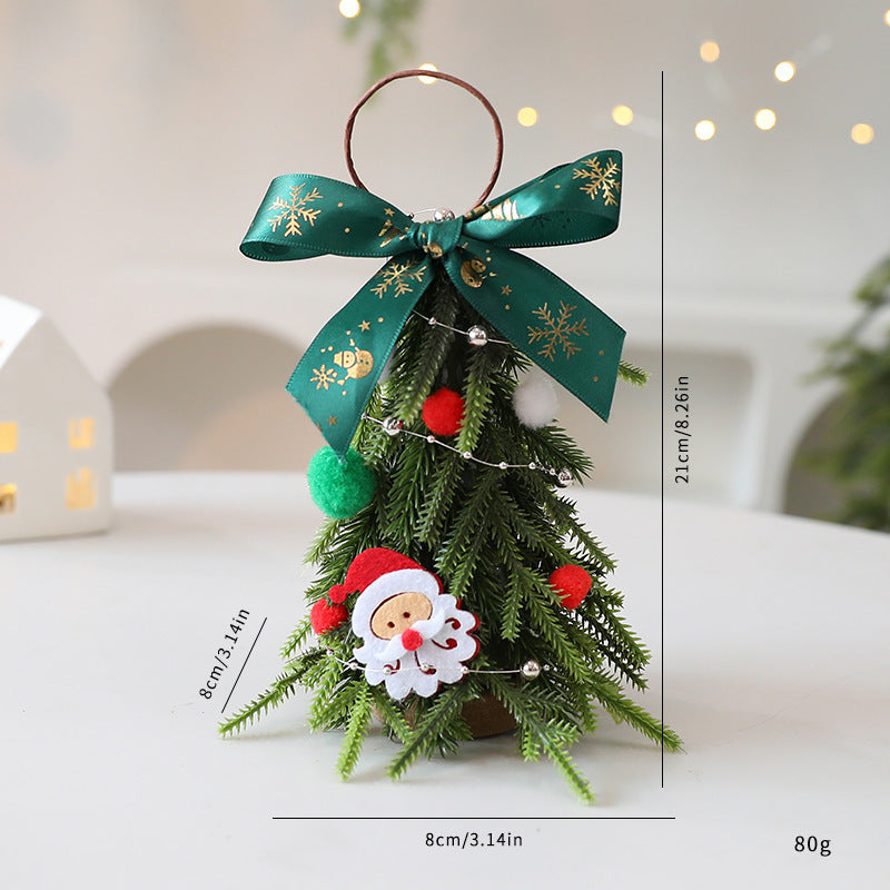 Mini Árbol Decorativo de Navidad 21 cm – 2 Diseños · Lazo verde · Papá Noel
