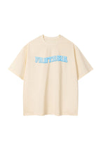 Camiseta Oversize con Estampado Gráfico · Albaricoque